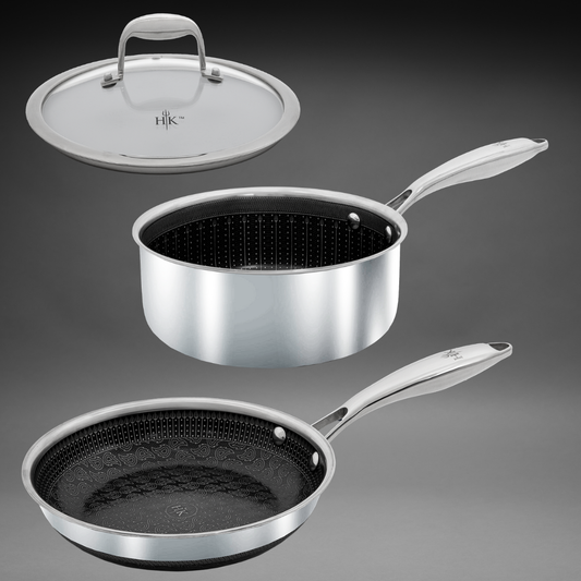 Image of a stainless steel fry pan, saucepan, and lid, with Hell's Kitchen flame pattern and pitchforks inside the pans